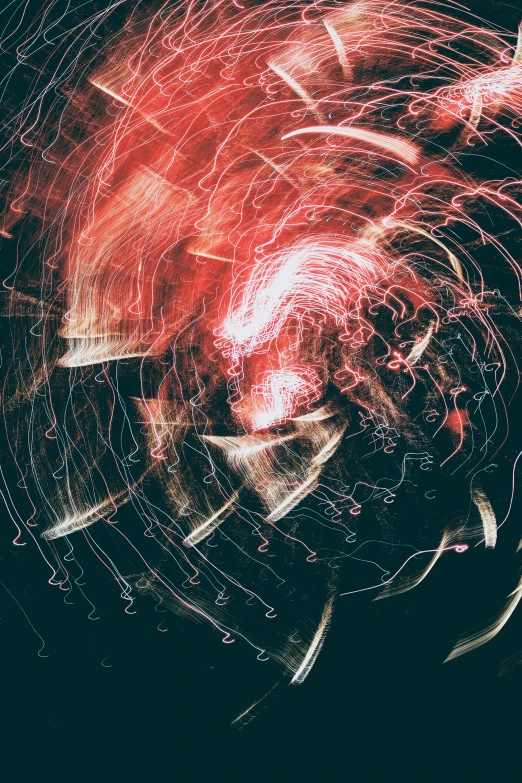 fireworks are seen over a crowd on the sidewalk