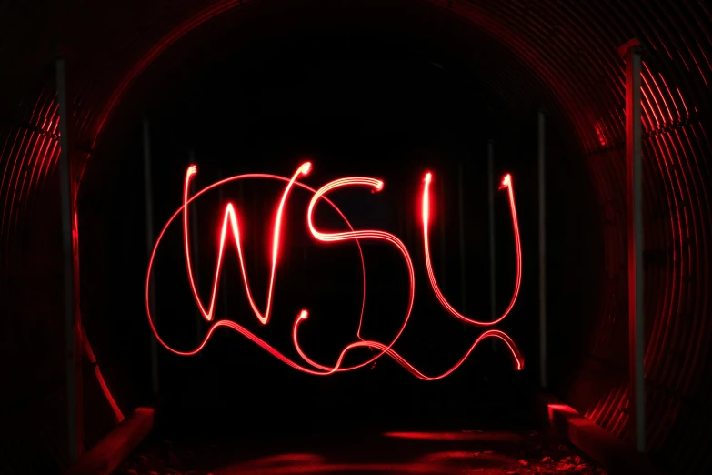 light paintings in the middle of a tunnel