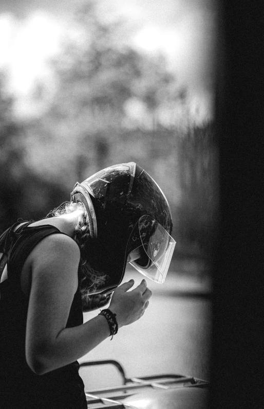 a person standing outside with her hat on