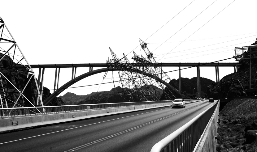 cars are traveling down the highway on an overpass