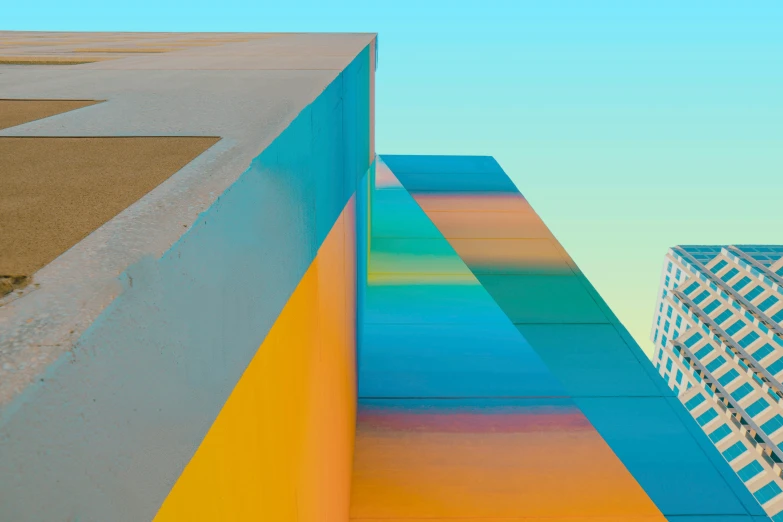 a close up of a wall with some colored blocks