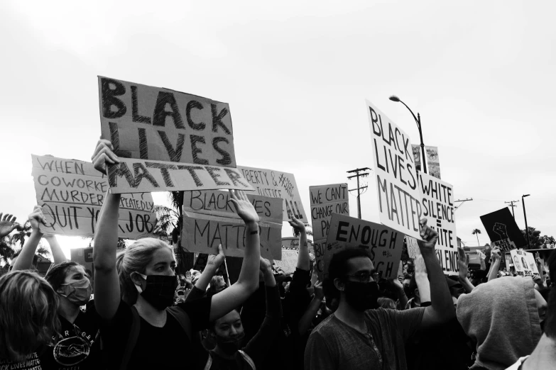 black lives protesters in new york holding up signs