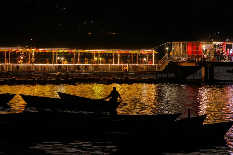 two boats that are floating in the water