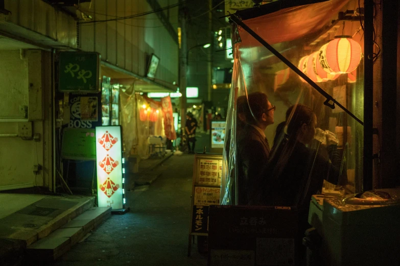 a man standing in front of a store