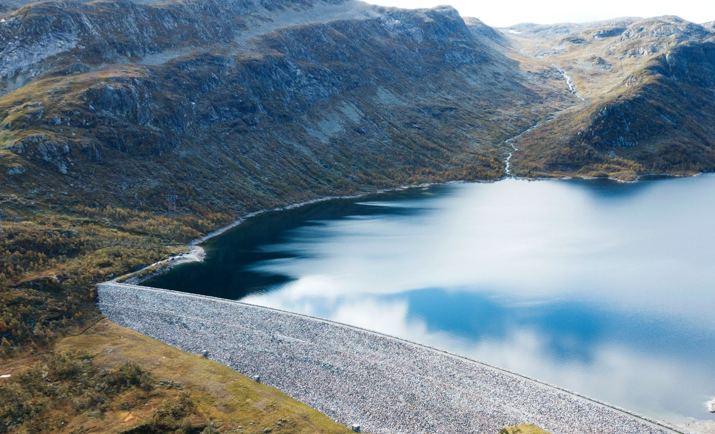 a view of a huge lake and some mountains