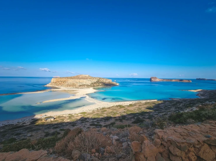 this is an aerial view of a rocky beach