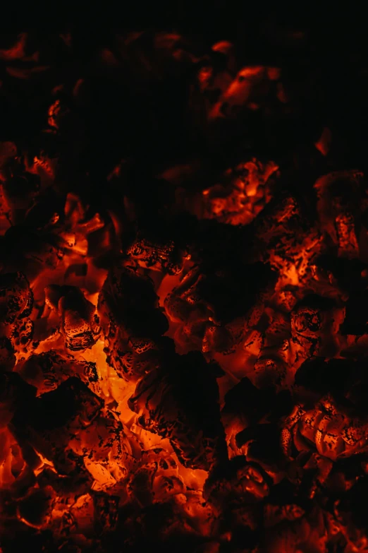 a pile of chicken sits on top of the grill