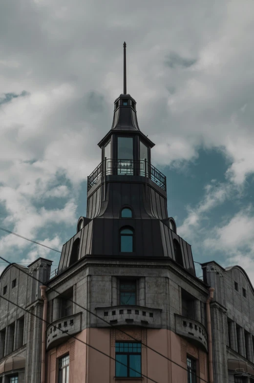 large tower with a sky background with many clouds