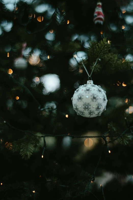 the top portion of a christmas tree is being displayed