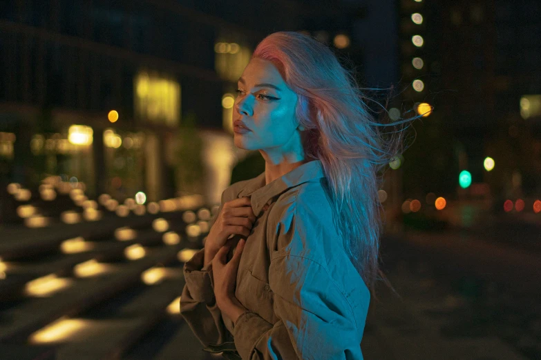 the young lady is staring out at the street