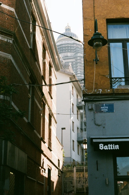 this po shows a back alley of a brick building