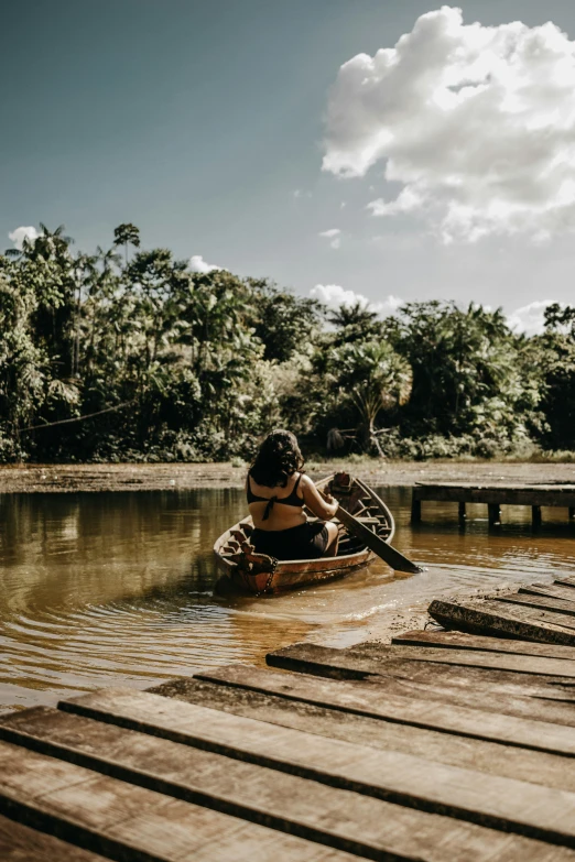 a  on a paddle boat on a body of water