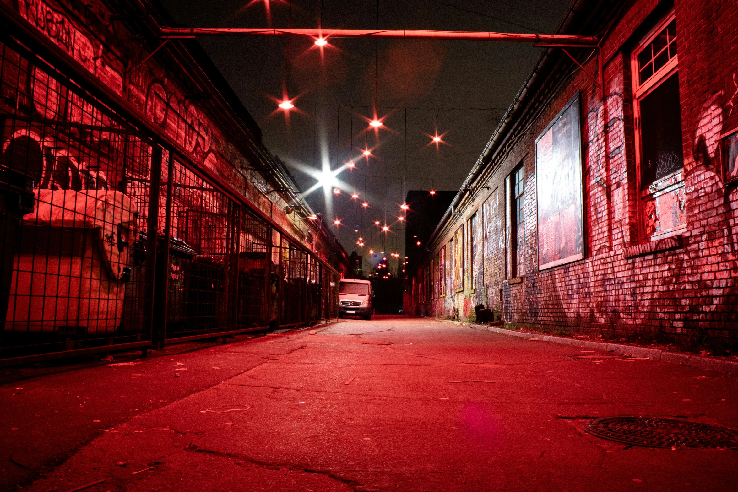 a parking lot with some red lights on it