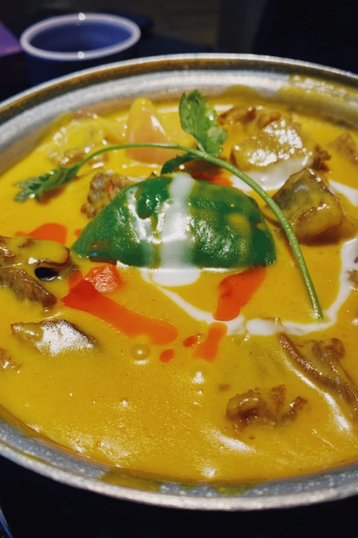 a bowl is filled with food on a table