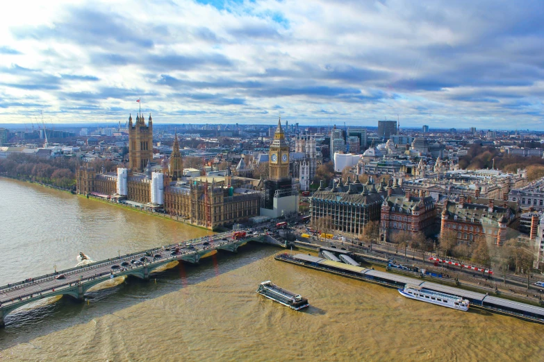 an aerial view of a bridge over a city