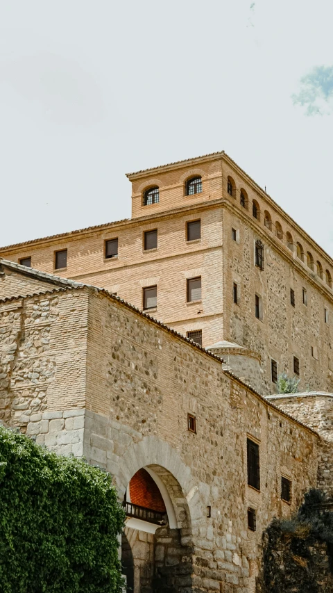 a tall tower building with a clock built into it's side