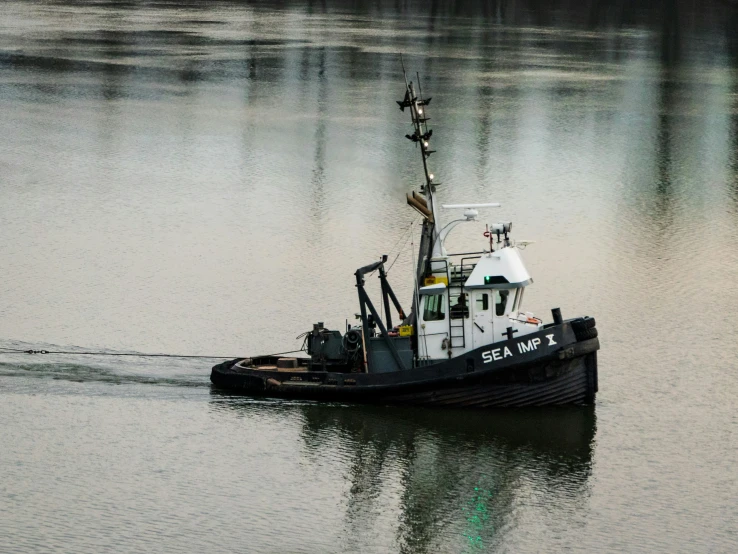 a boat floating across a large body of water