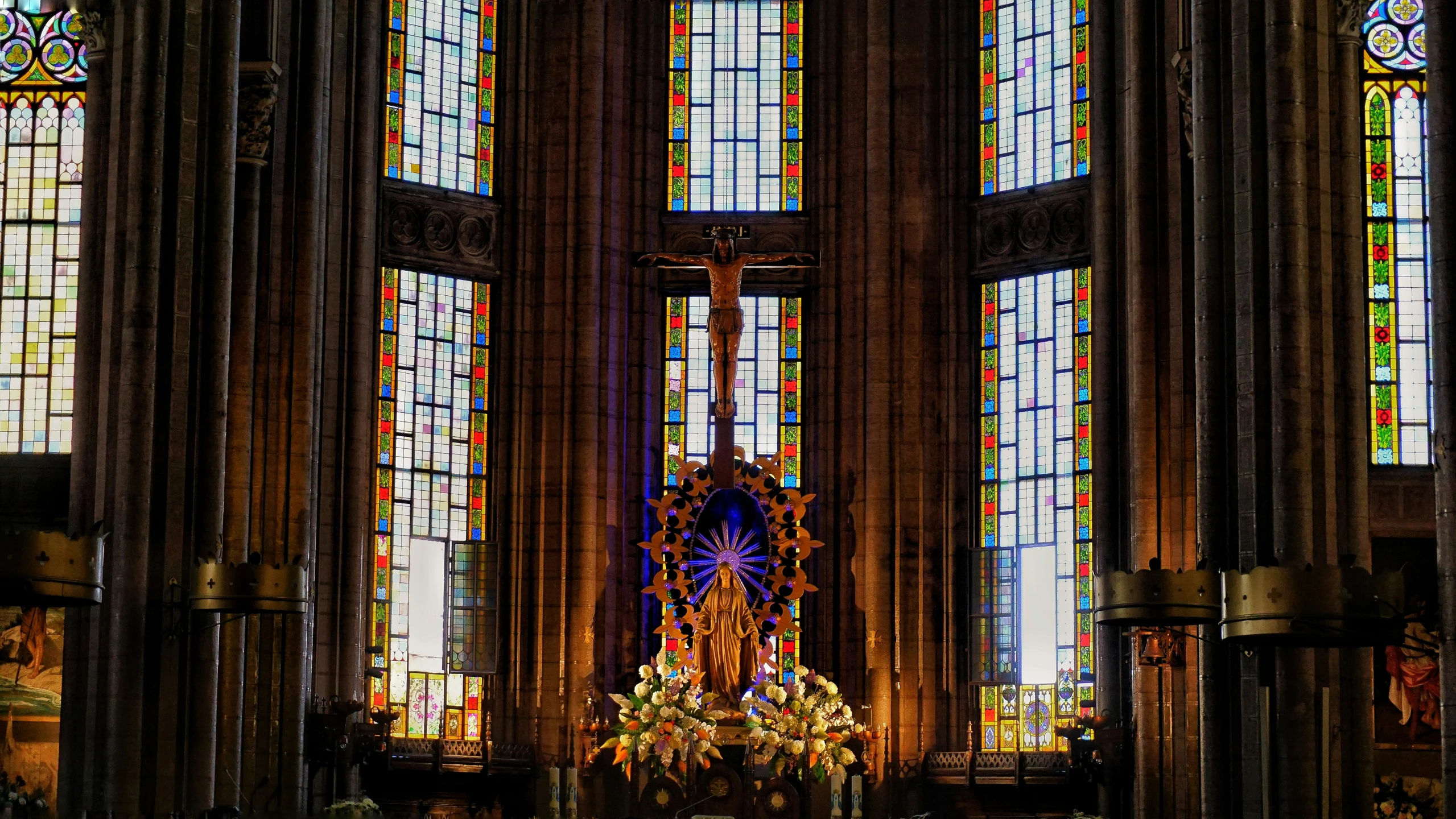 a church has three large stained glass windows