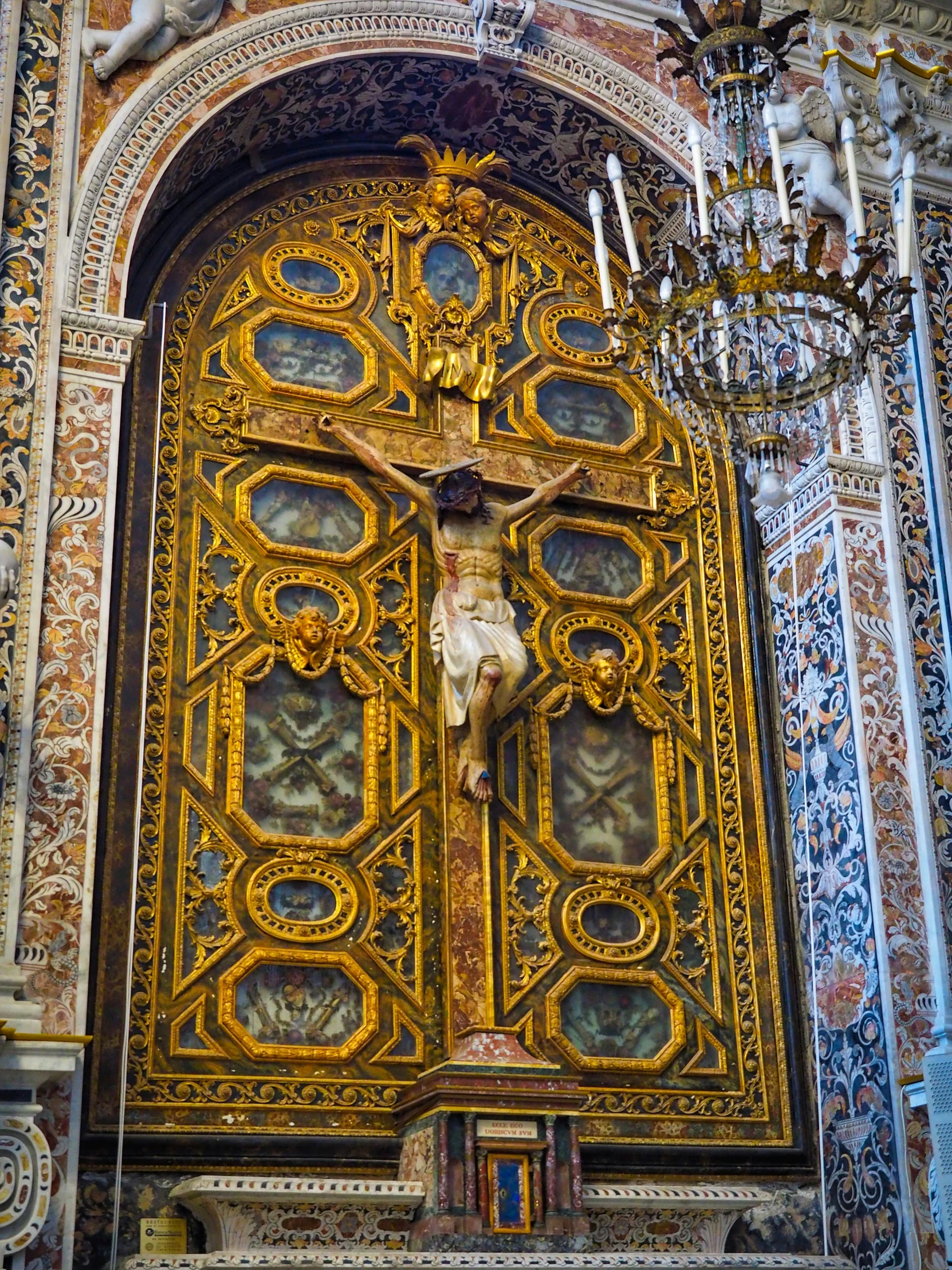 the interior of an old church with ornate paintings on it