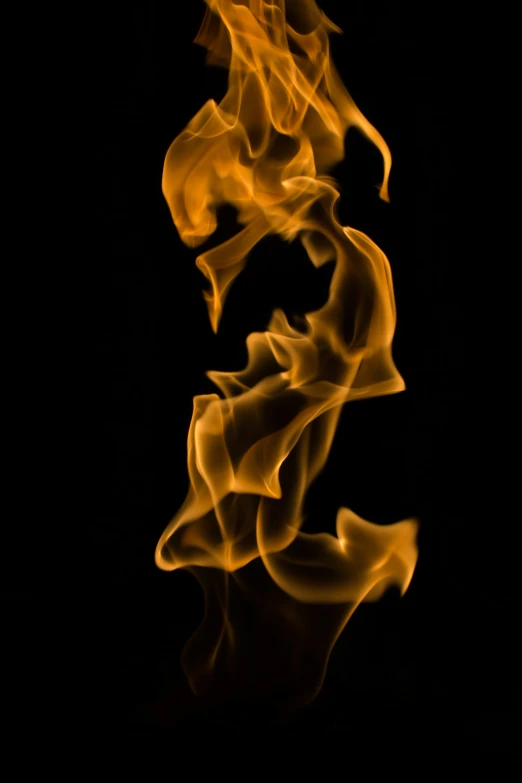 some orange flames against a black background