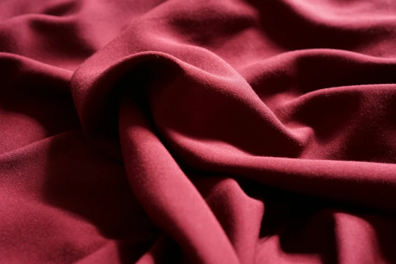 a close - up view of the fabric for a gown