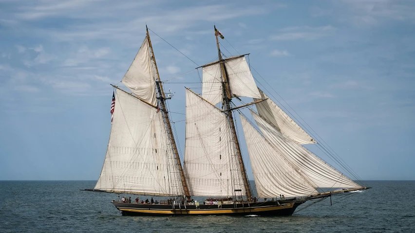 a sailboat on the water during the day