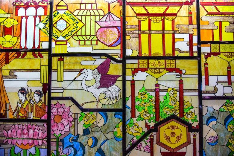 a very large stained glass window with different designs