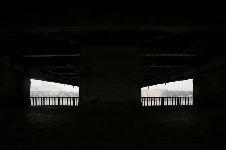 a couple of empty parking spaces in the middle of a tunnel