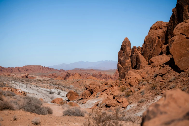 view from a rocky cliff with a sky in the background