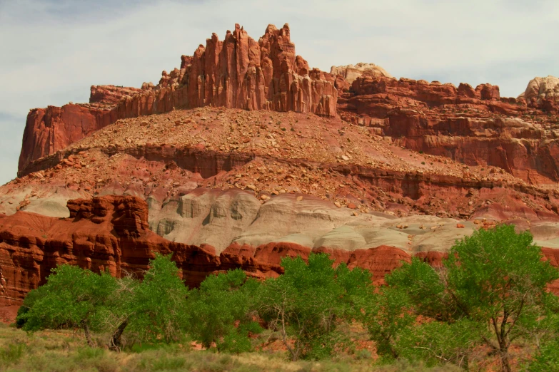 the mountains are covered with desert style red rock