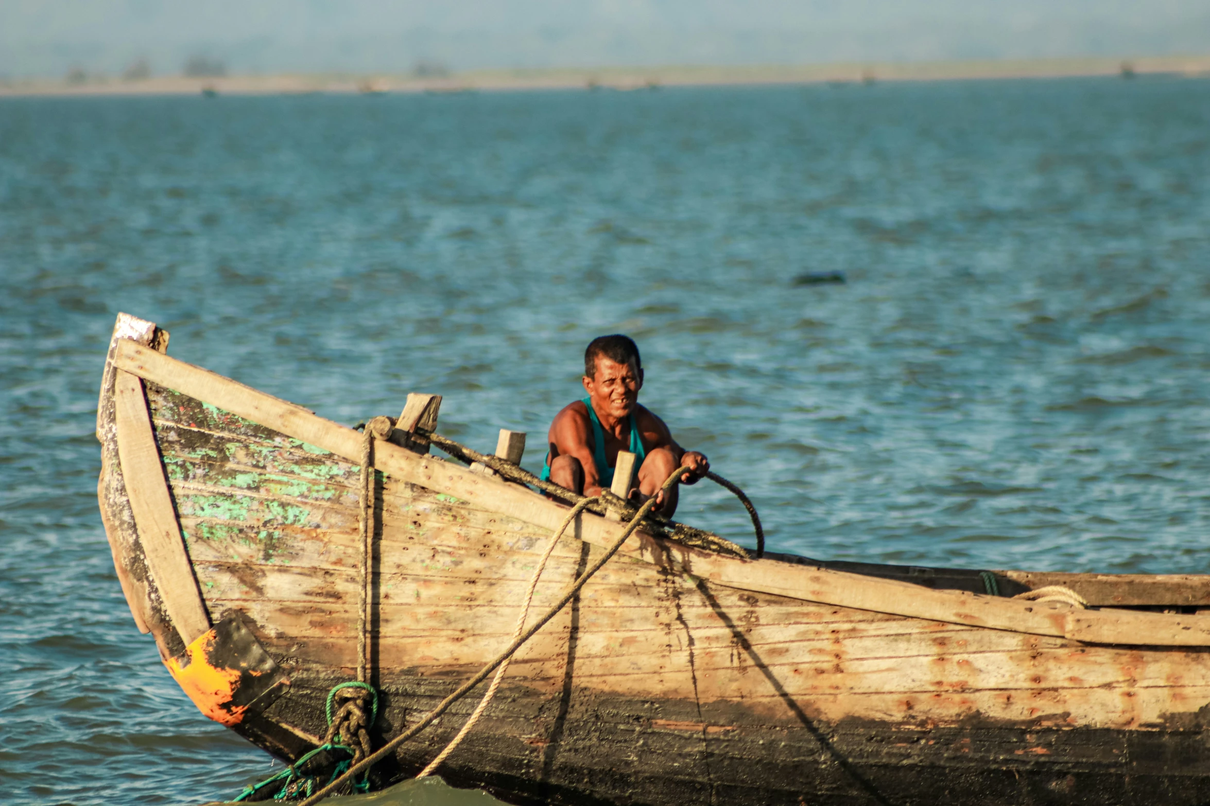 a child on a boat in the water