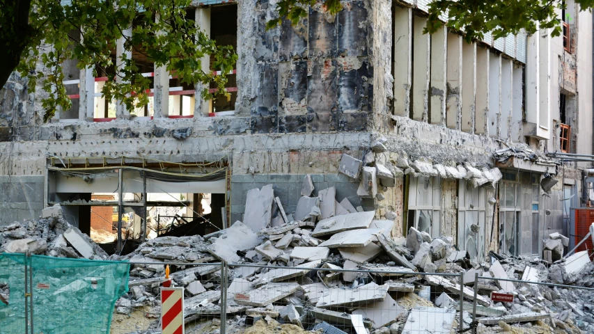 a building with a bunch of debris in front of it