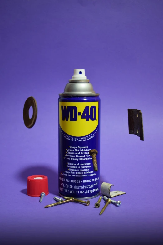 a can of cleaner with tools nearby