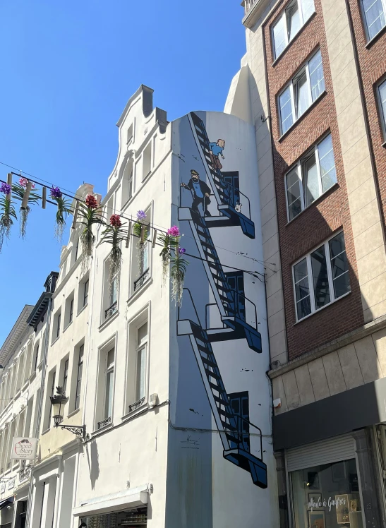 blue and white buildings in the city with colorful street signs on them