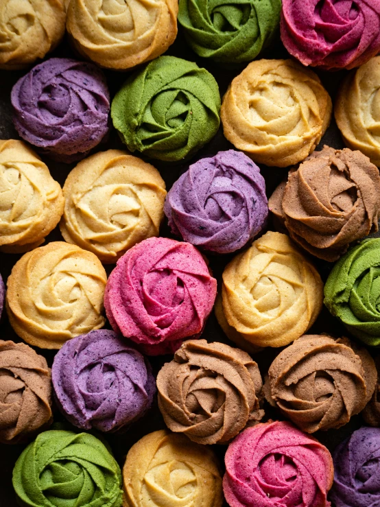 an assortment of various types of colored icing