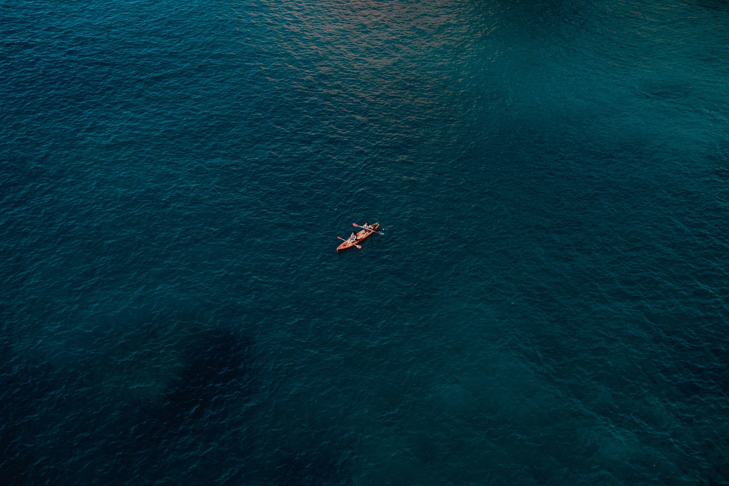 the view from above of a person in a kayak