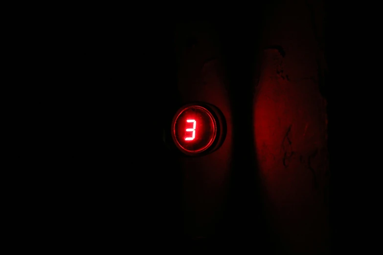 red on with the letter e in the dark