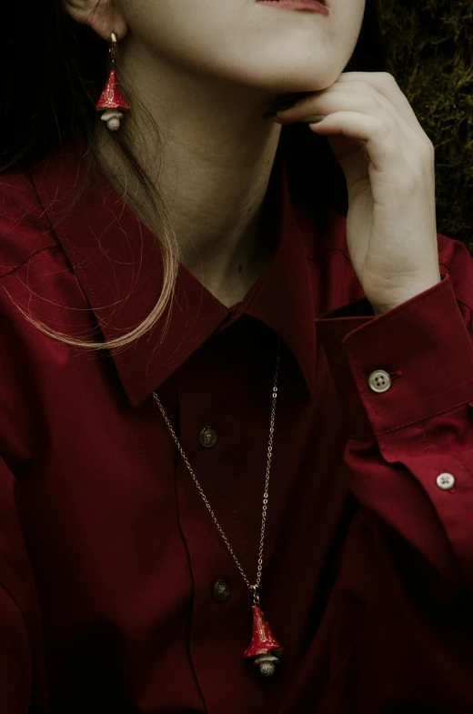 a close up s of a woman wearing earrings