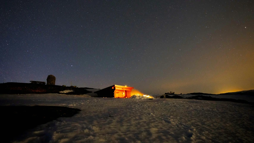 snow covered roof and a light on it