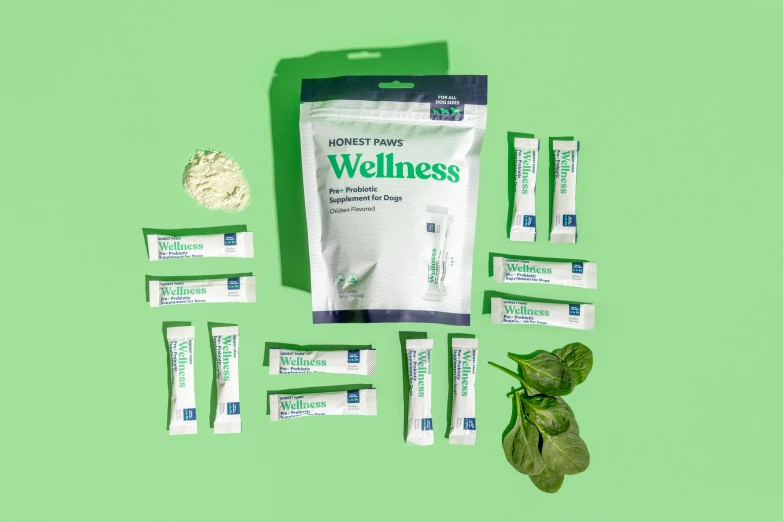 some sort of medicine product set out on a green background