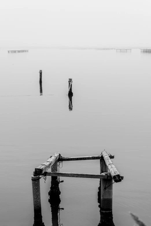 the reflection of some water and a boat in it