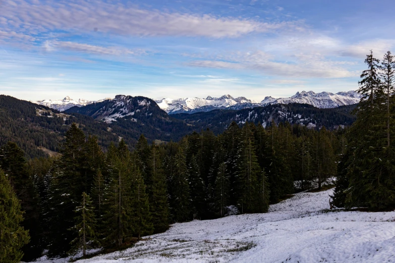 a view from the top of a snowy mountain