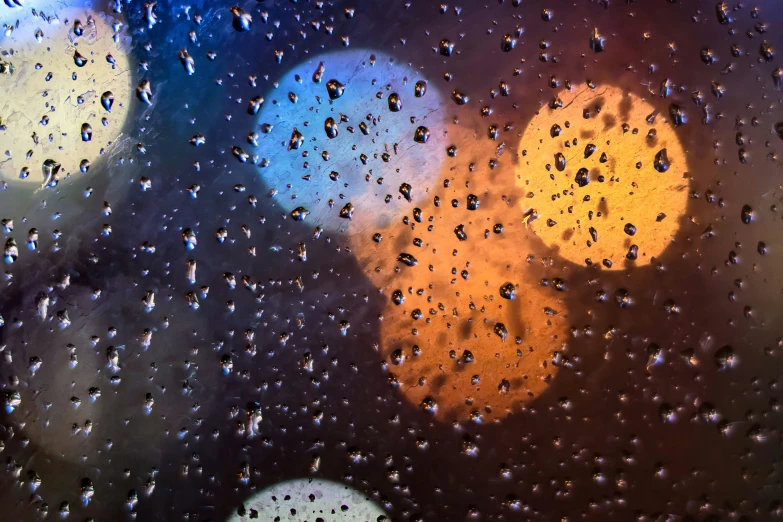 rain drops on the windshield of a car