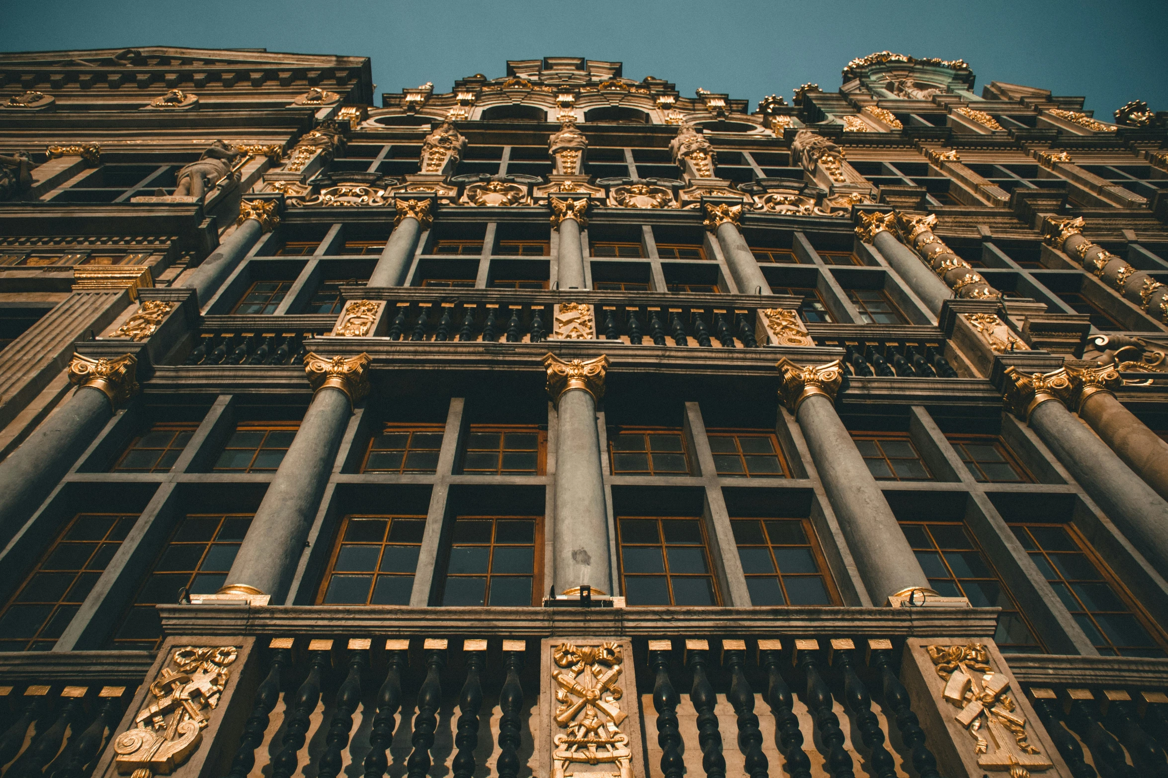 looking up at the side of an ornate building