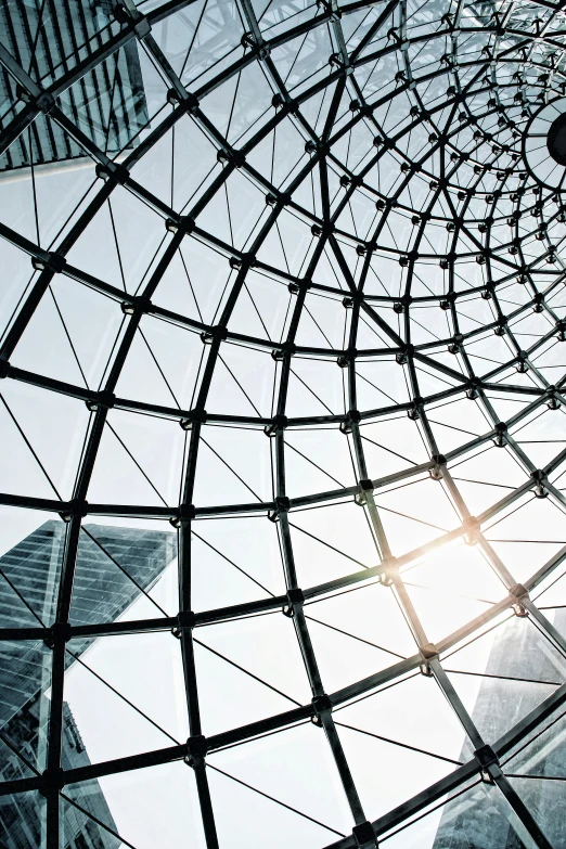 view through metal circles with sun peeking out