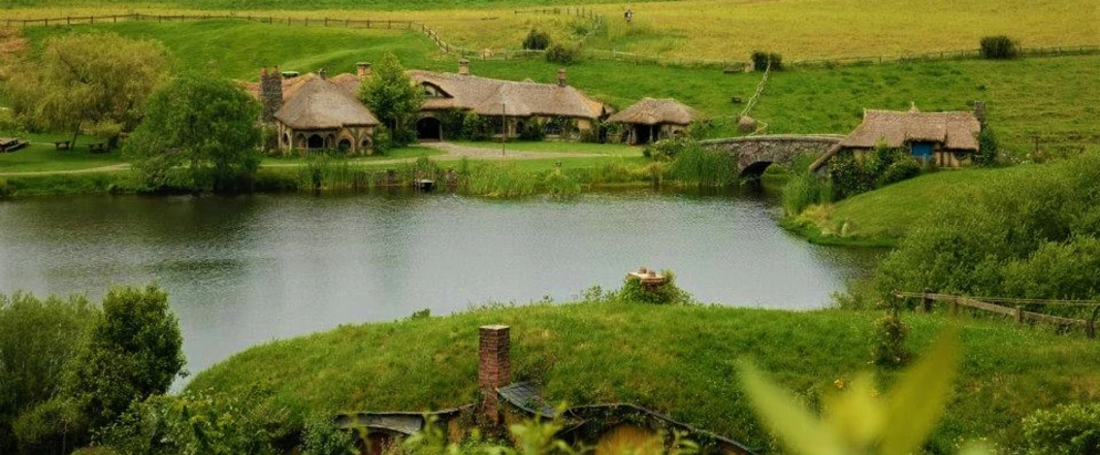 the houses on the hill have a pond