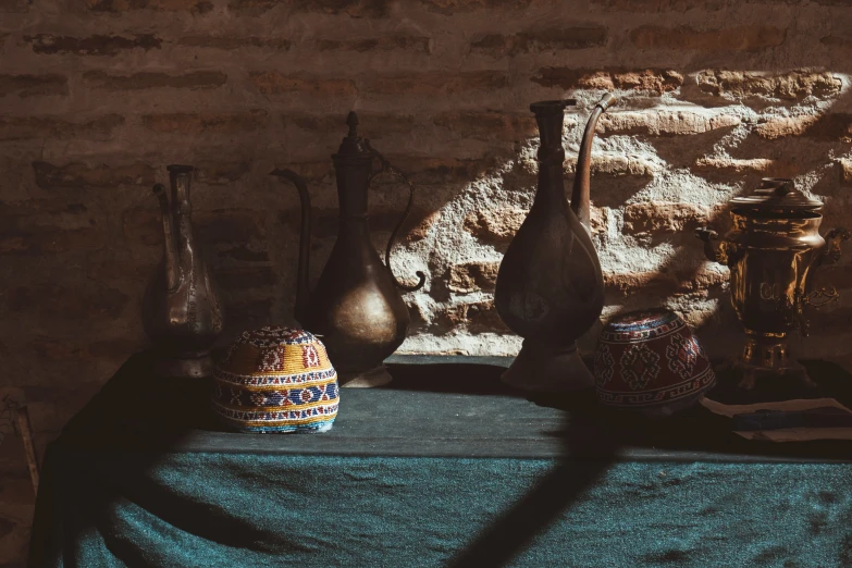 an assortment of vases are on display