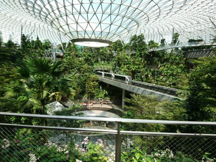 a view from above of a building with many trees