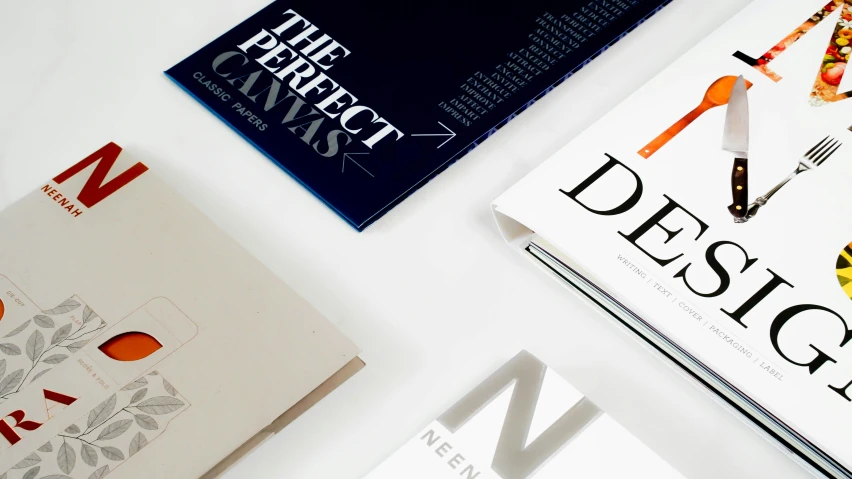 a white table with many different types of books