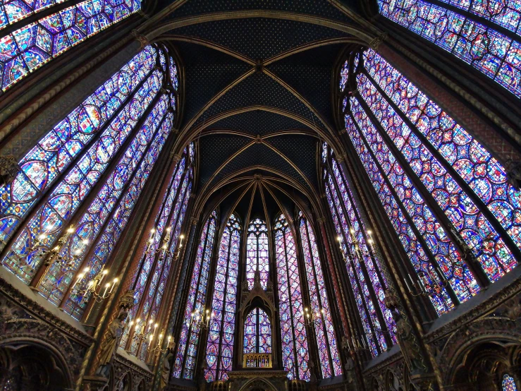 the ceiling of a large stained glass church